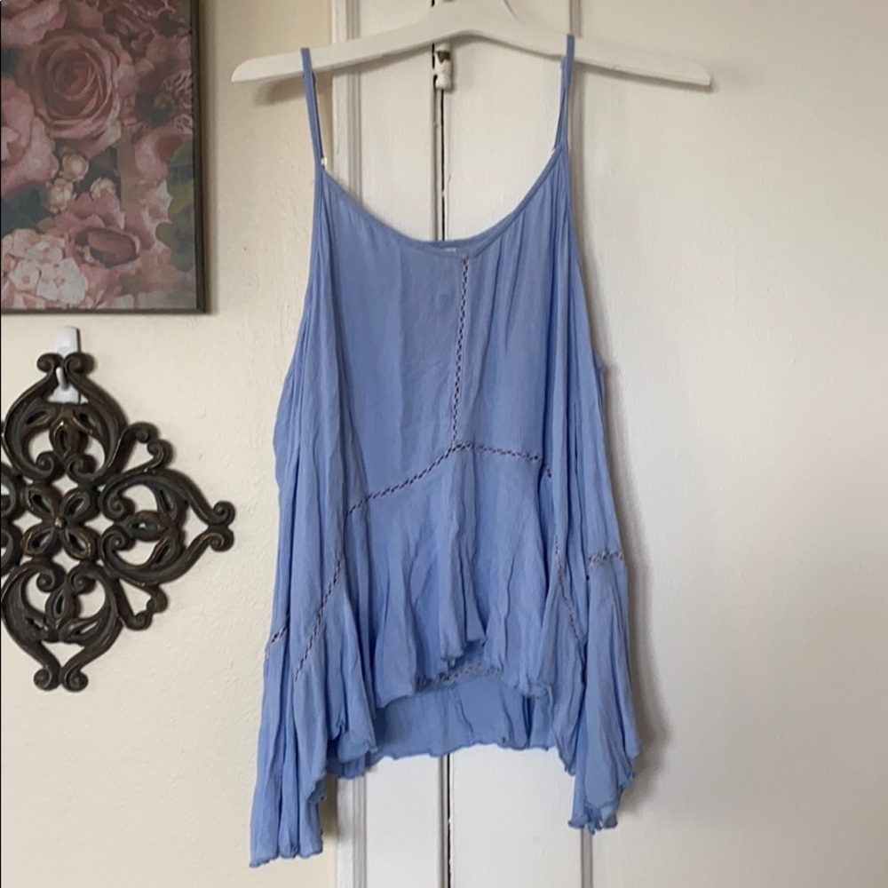 Pale blue off the shoulder blouse.